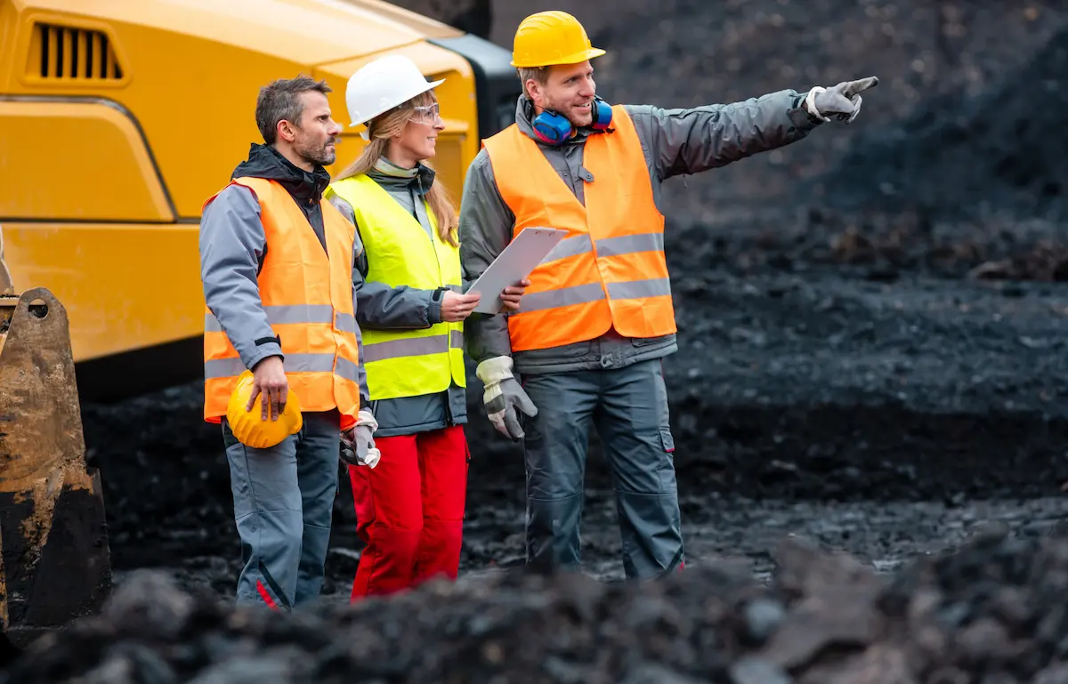 Construction professionals evaluating project site and planning using intelligence data for better bidding decisions